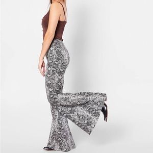 WE THE FREE Just Float On Snake Print Flare Jean